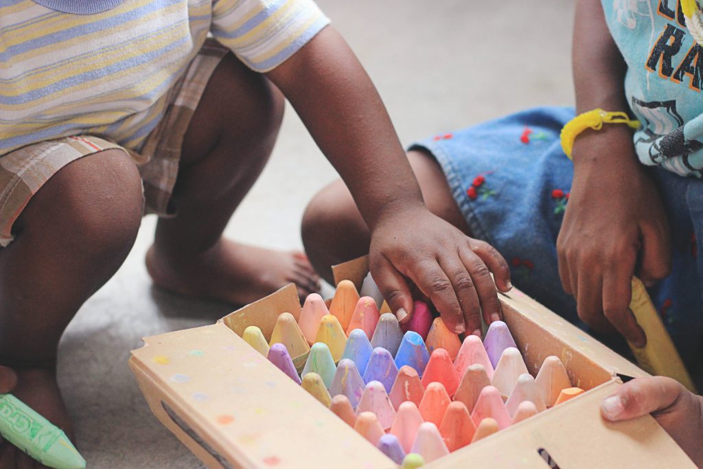 Children playing with chalk